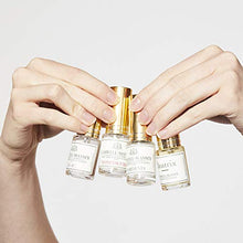 Load image into Gallery viewer, Caswell-Massey Eau De Toilette Sampler Gift Set - Travel Size NYBG Floral Fragrances in Honeysuckle, Gardenia, Lilac and Rose Scents, 15 ml Each (Set of 4)