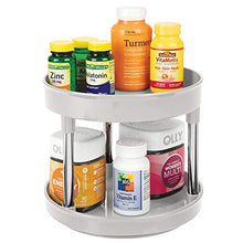 Load image into Gallery viewer, mDesign Spinning 2-Tier Lazy Susan Turntable Storage Tray - Raised Edge, Rotating Organizer for Bathroom Counter Tops, Dressing Tables, Makeup Stations, Dressers - 9 Inch Diameter - Light Gray/Chrome
