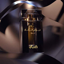 Load image into Gallery viewer, Nebras Al Ishq Noor Unisex CPO - Concentrated Perfume Oil (Attar) 6 ML (0.2 oz) | Intensely Captivating | Dark Nauces of Rose and Jasmine w/Precious Oud | Elegant bottle | by RASASI Perfumes

